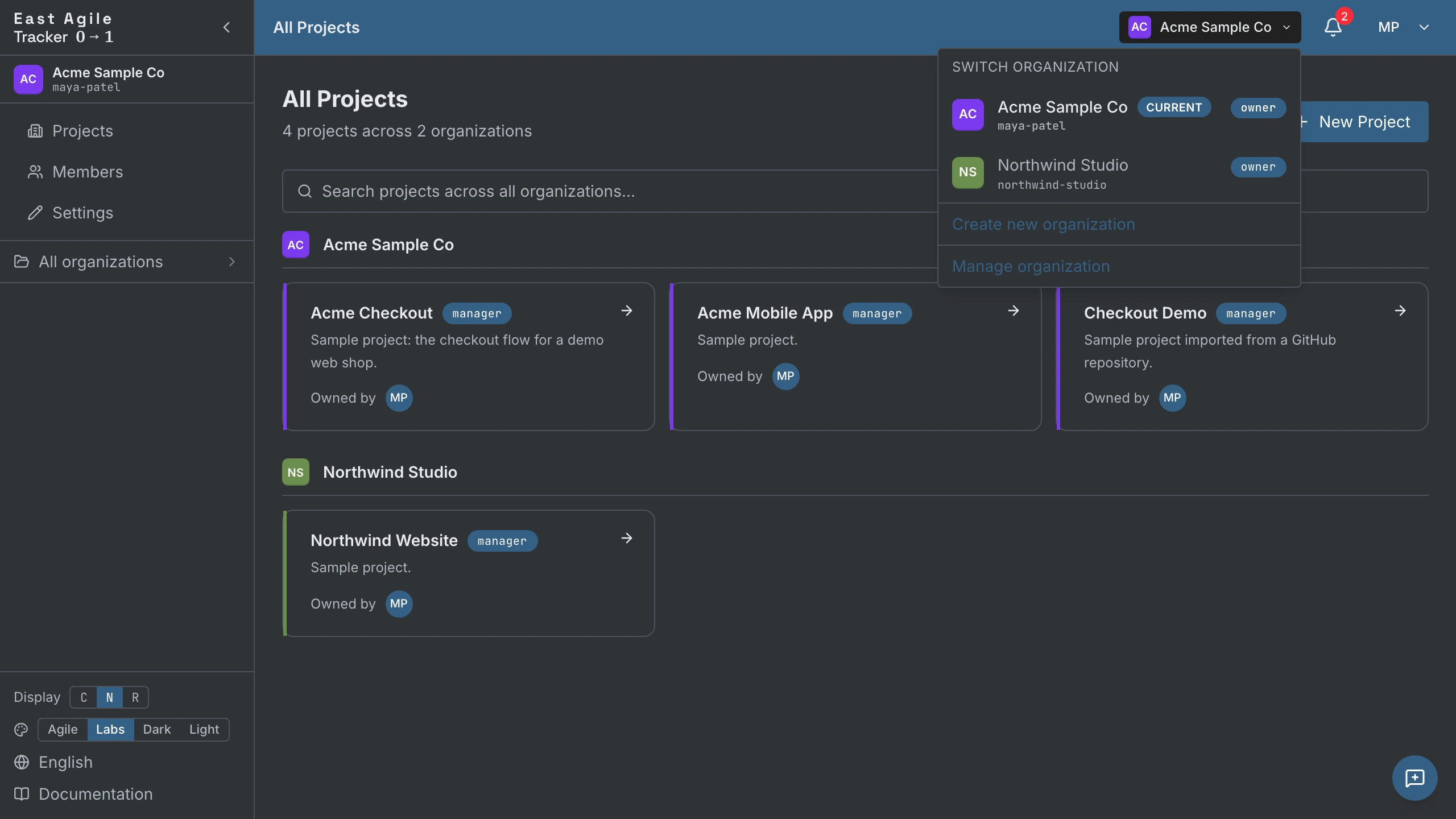 The organization switcher open in the top bar, listing two organizations